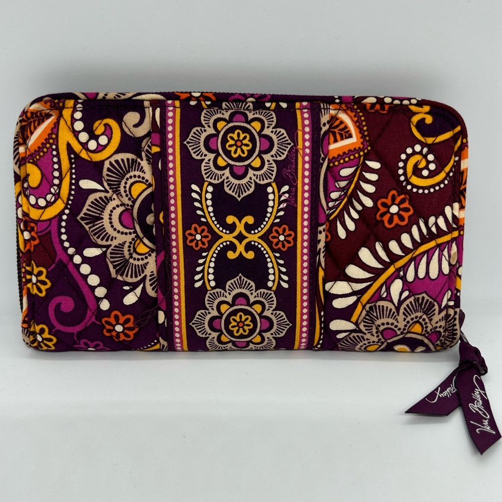Vera Bradley Zippered Clutch Wallet in Retired Pattern “Safari Sunset.”